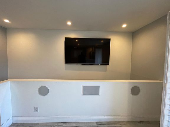 Built in surround sound with massive TV (TV will stay with condo)