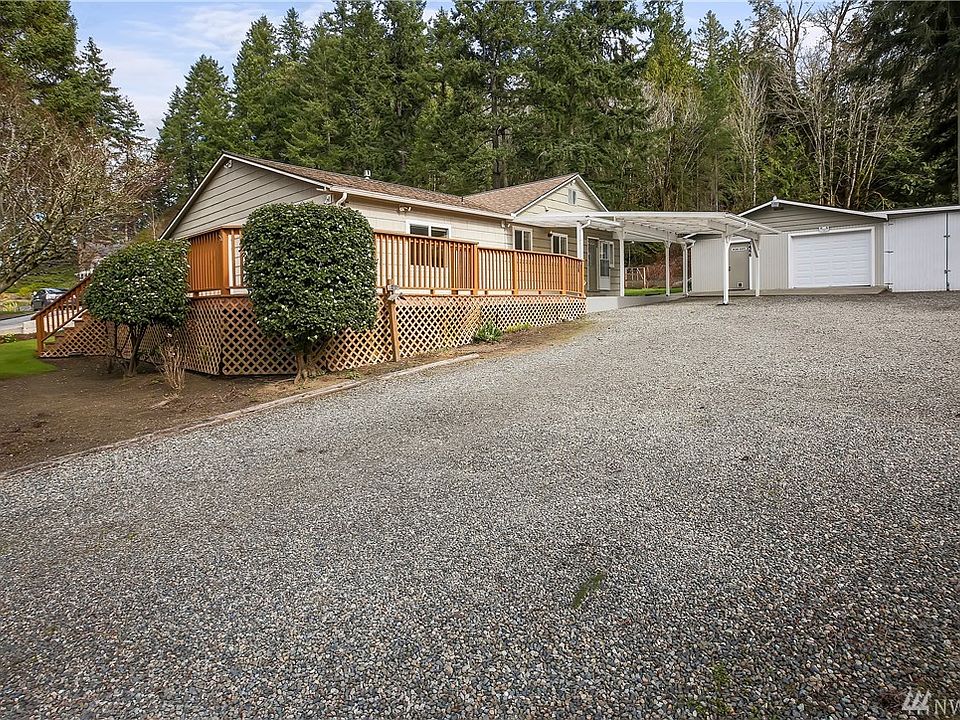 6466 Beach Drive is a large view rambler on two lots --- nearly an acre.