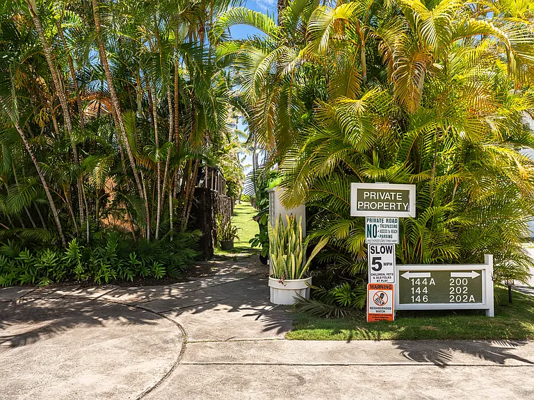 Entrance to the private beach access pathway.