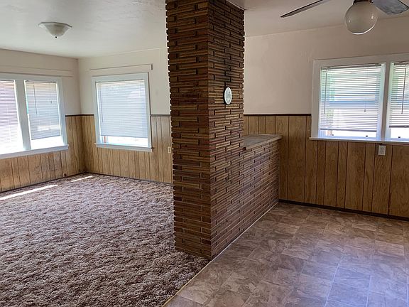 Separate open room next to dining area, perfect for an office, game room, kids play room, etc.