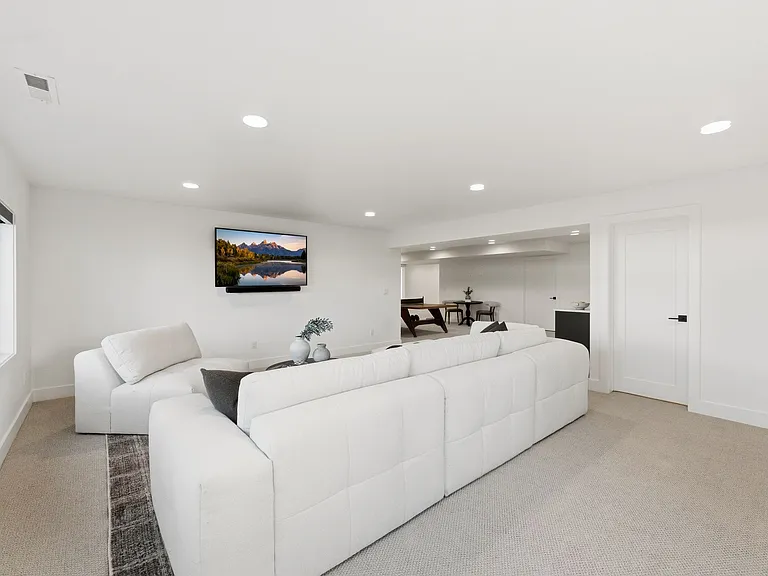 Large entertainment room | Downstairs. Extra storage