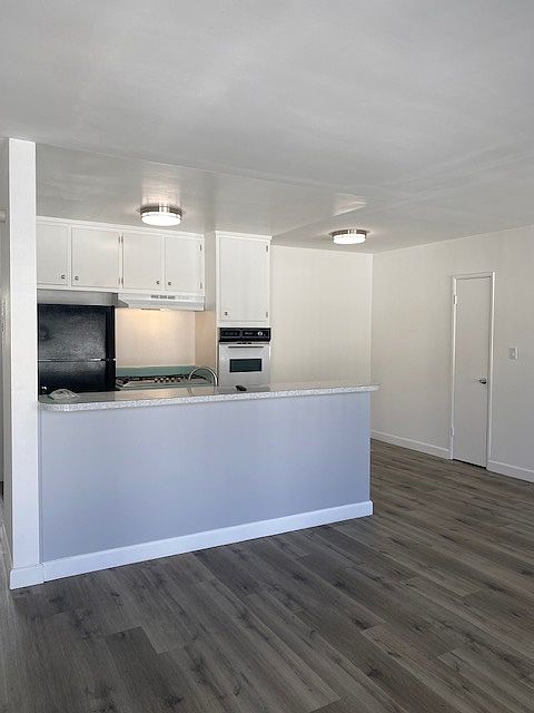 Large Living Room that opens to Kitchen