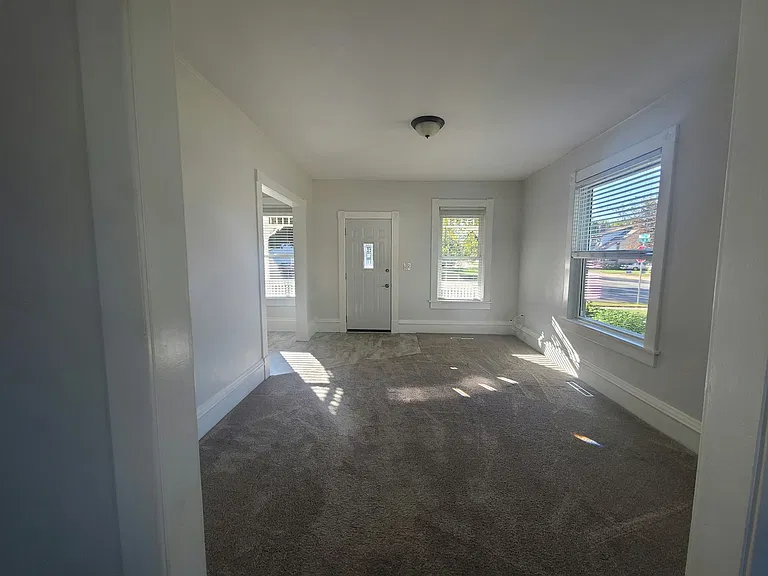 Living room to front door area