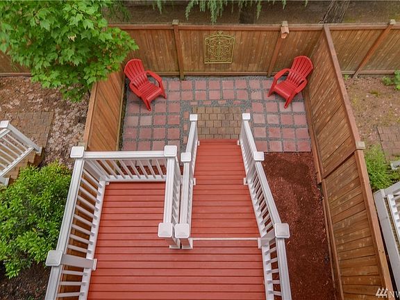 New deck and fenced yard directly off kitchen.