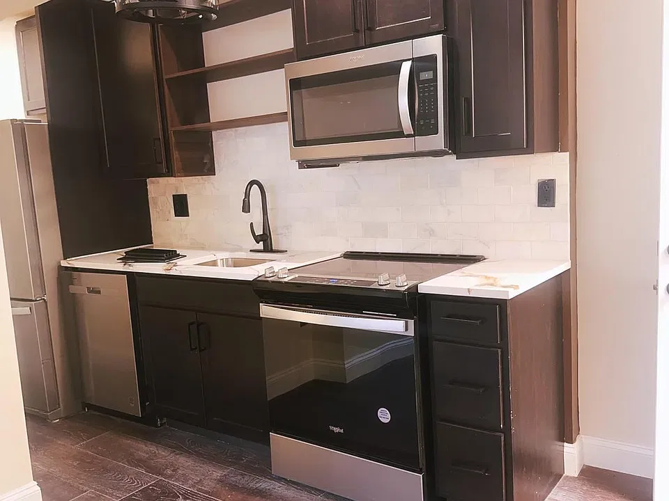 Updated Stainless Steel Kitchen. Dishwasher, Fridge, Microwave, Etc. included.