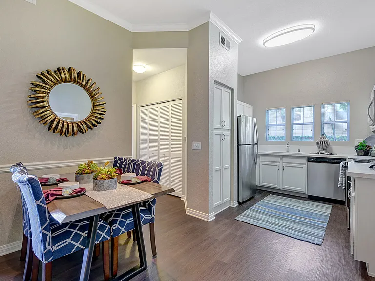 Open layouts with wood plank flooring throughout the living space