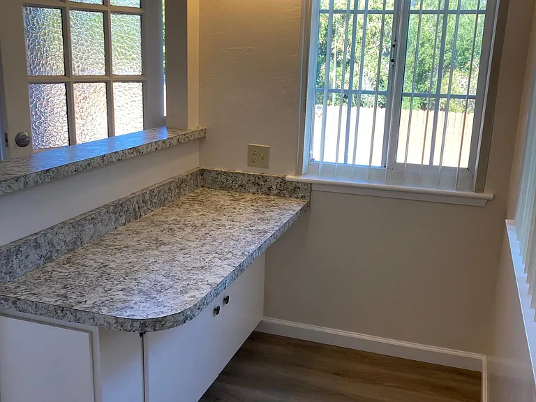 Dining area-breakfast bar with additional storage.