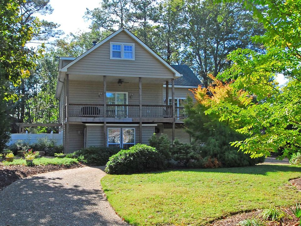 Front of home with circular driveway