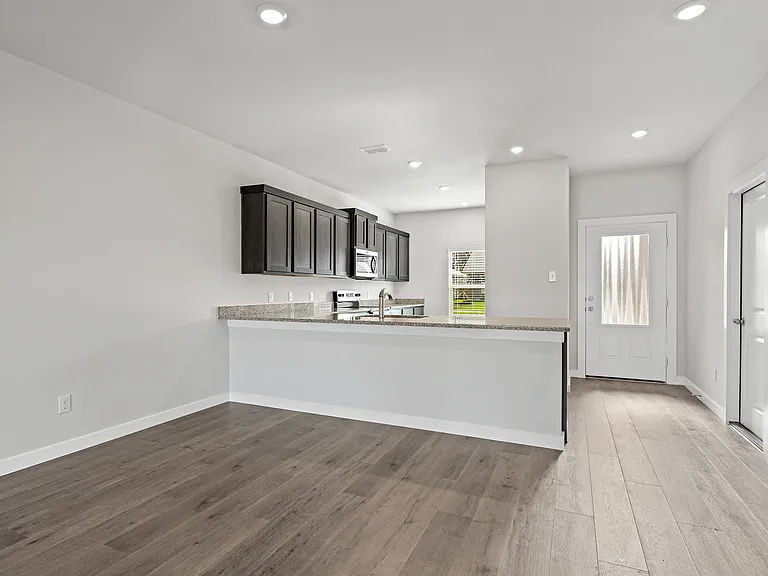 The dining room sits right off of the kitchen.