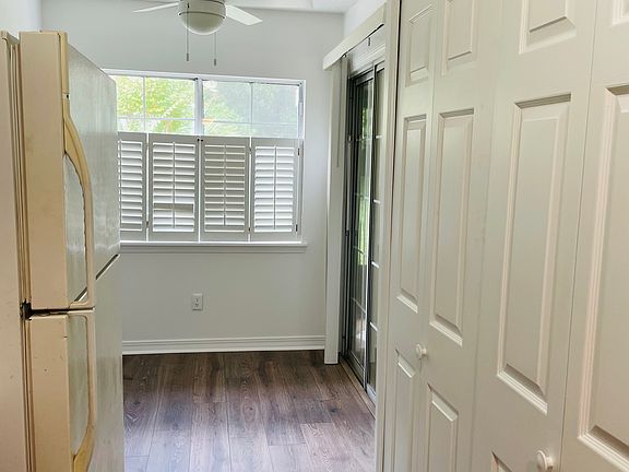 pantry to the right, eat in kitchen with sliding door to screened in porch
