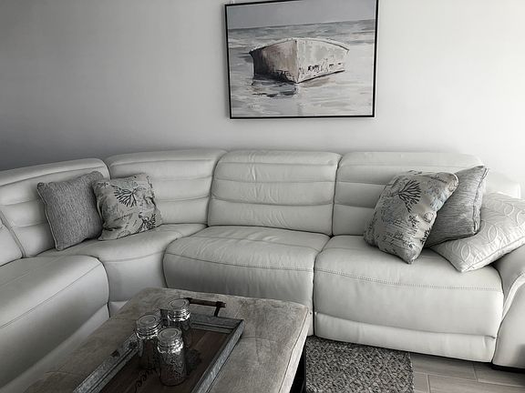 Sofa with 3 reclining sections.