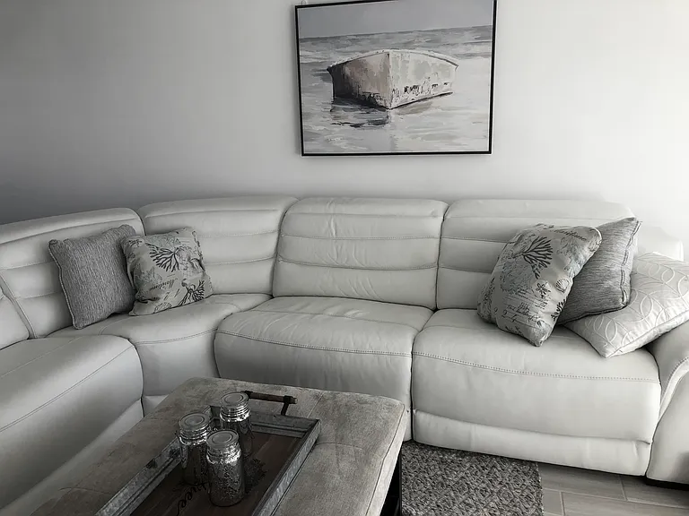 Sofa with 3 reclining sections.