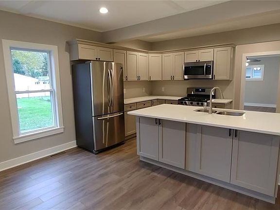 New solid wood cabinets, new Samsung 4 piece appliance package, quartz counters