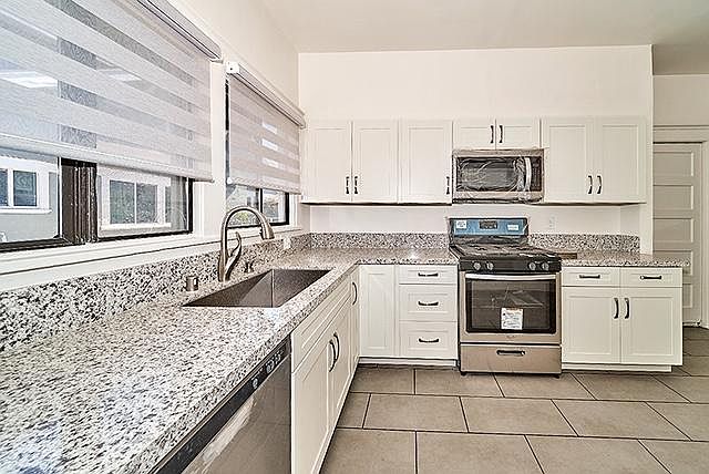 View of kitchen from the laundry room.