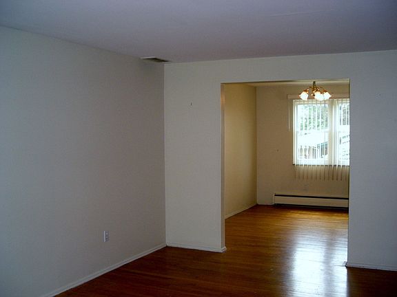 living room & dining room hardwood flooring recently exposed.