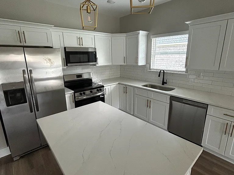 Kitchen with brand new stainless appliances