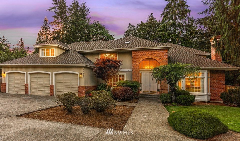 Spacious home is located in the sought after community of Lake of the Woods just a couple blocks to the lake.