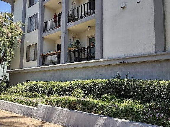 Street View. Condo building has 3 levels.