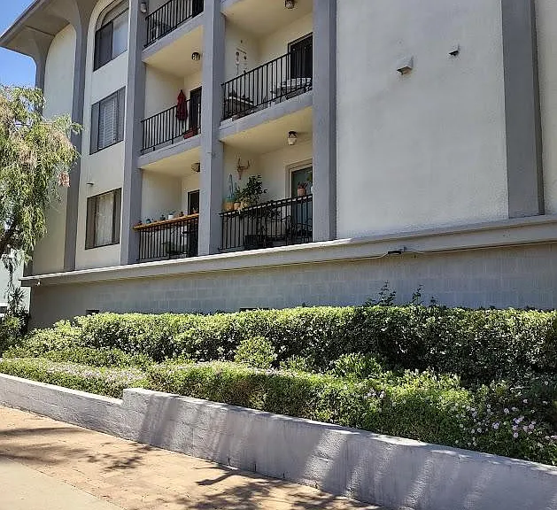 Street View. Condo building has 3 levels.
