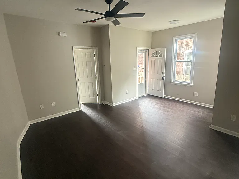 Living Room Looking at Bedroom and Front Door