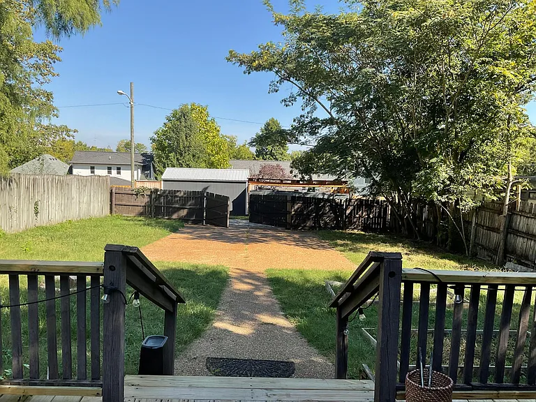 Stairs from deck to backyard and driveway, (off street parking for multiple cars)