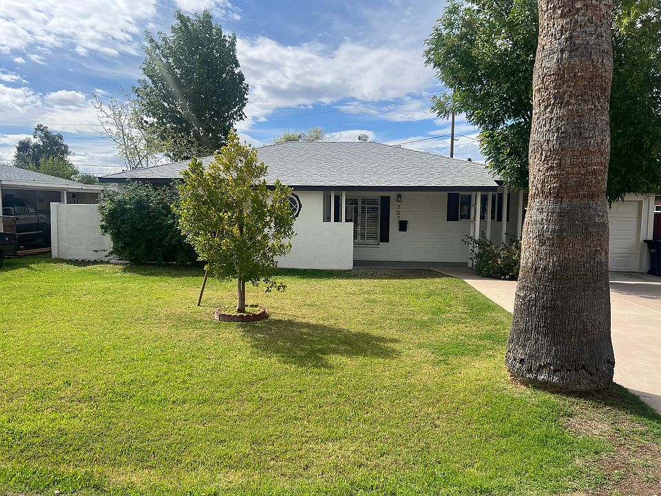 Green front yard & 2022 painted exterior