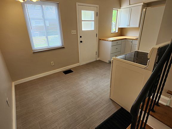 Bottom of stairs to eating space/kitchen