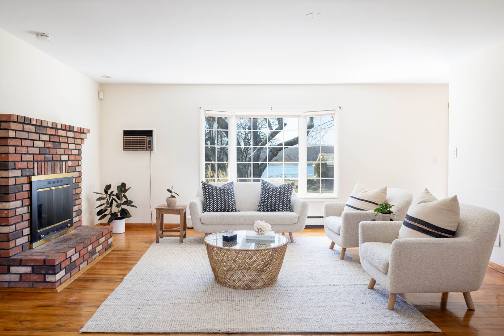  Living Room w/ Fireplace and Water Views