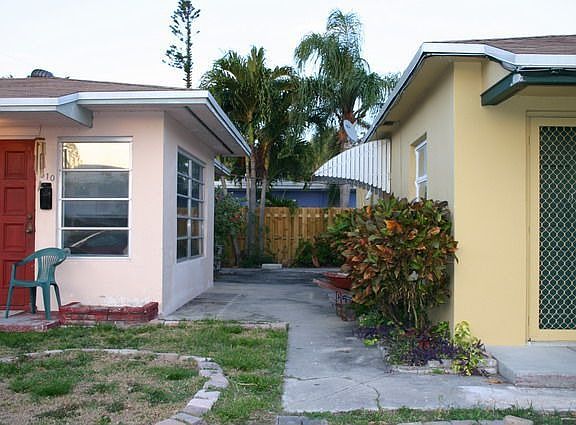 Live in one building, rent the other!