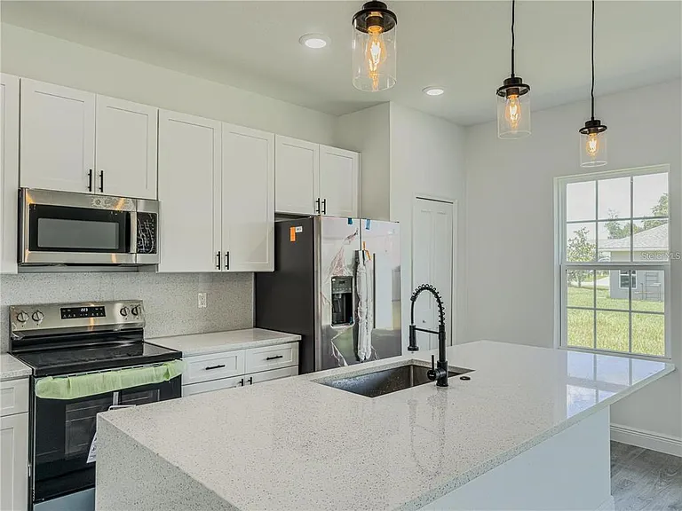 14245 SW 28th Ct — Photo 38