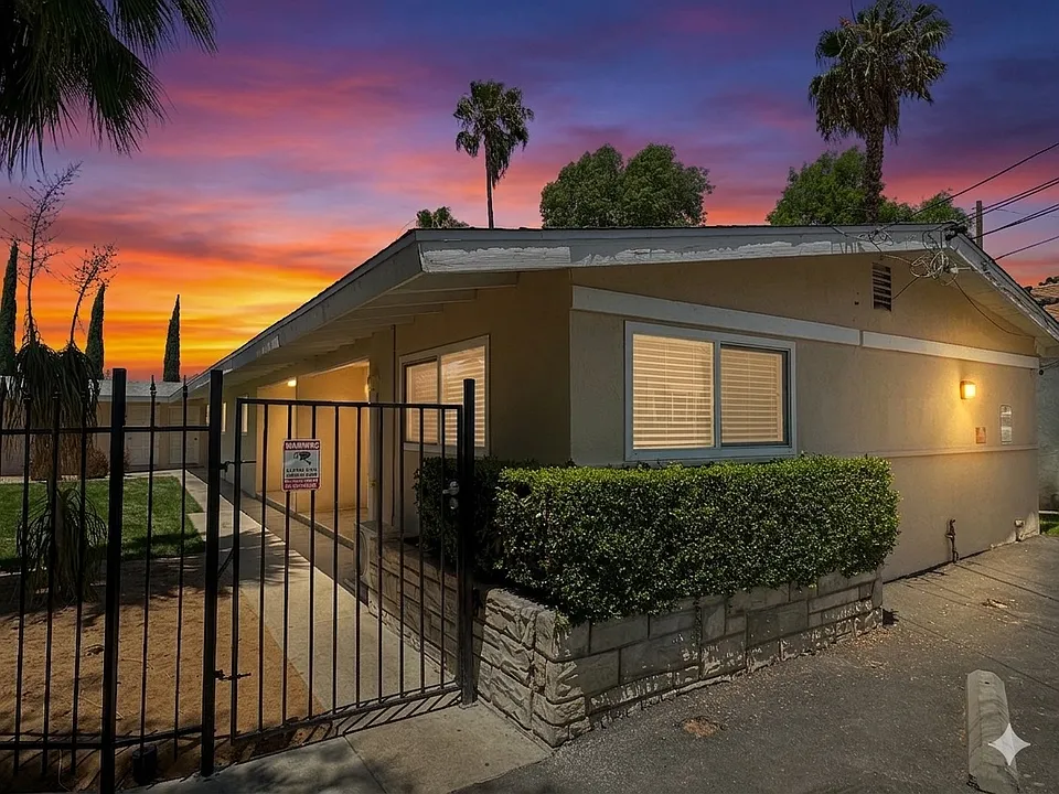 Front of gated unit, sunset added.