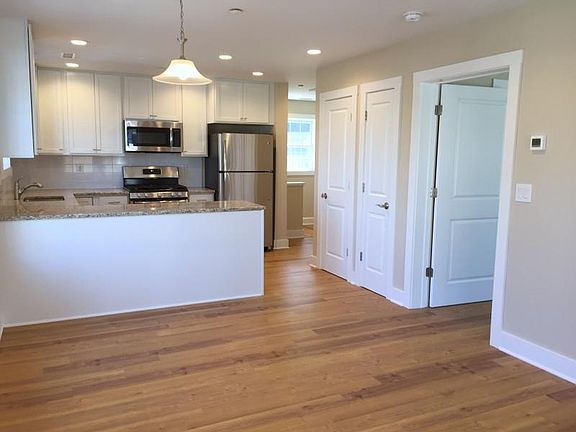 View of kitchen from living/dining area