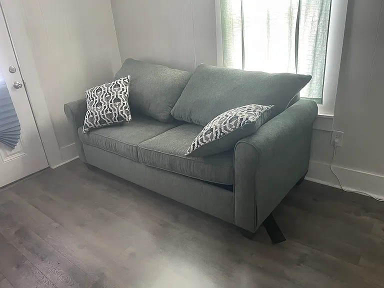 Living room with new sofa.