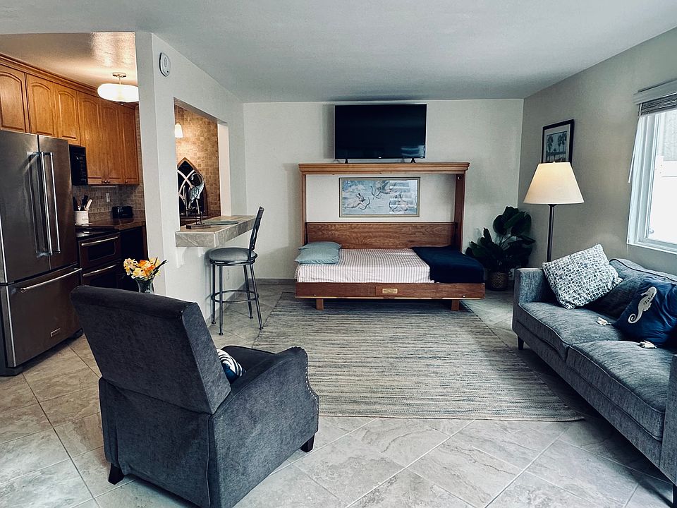 living room with Murphy Bed extended