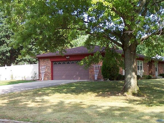 Brick Ranch setting on a Corner lot with Fenced in Backyard!