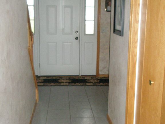 Foyer with large coat closet