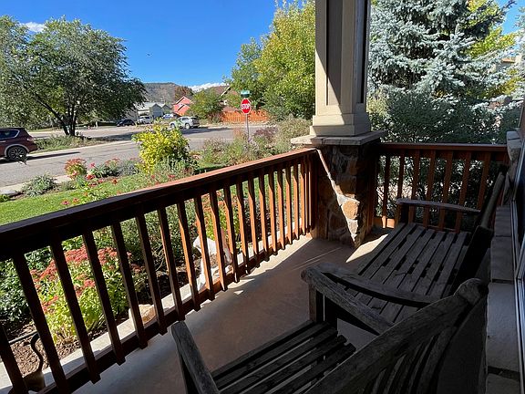 Covered front porch to watch the world go by.