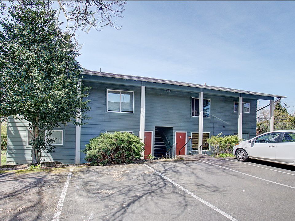 Front of building with parking