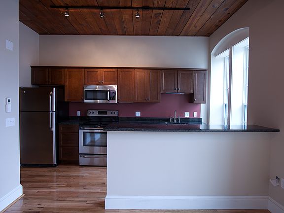 Kitchen with breakfast bar from living room