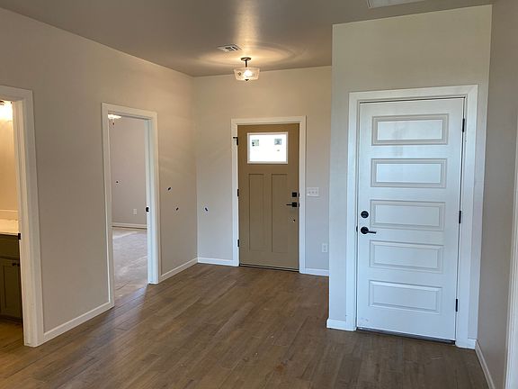 Front Door
Garage Entry on the right
Bedroom #2 entry on the left