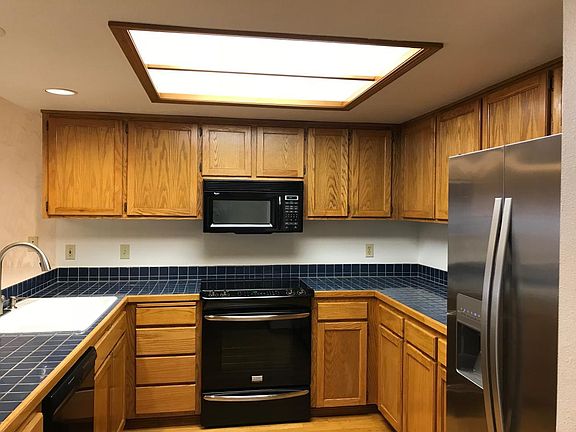 Kitchen with refridgerator, dishwasher