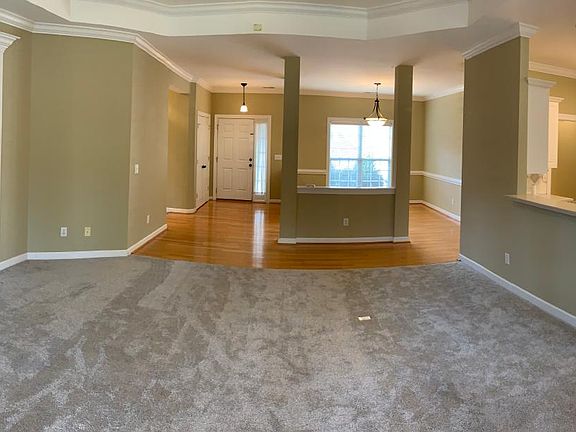 Hardwood floors, new carpet, and a open floor plan.