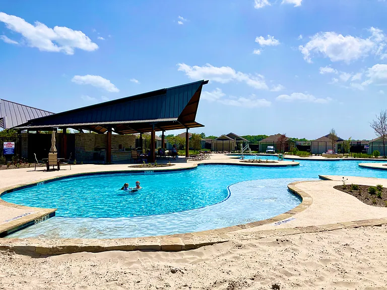A second pool is available for community members and also has outdoor kitchen areas and bathrooms.