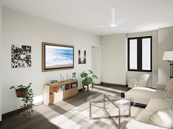 Living room with spectacular sunset views of Coconut Grove and the Miami skyline