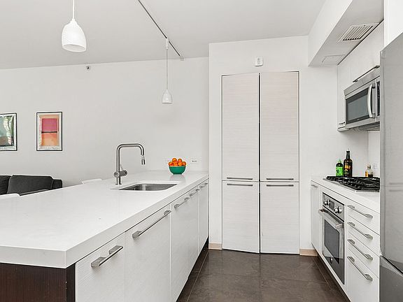 3rd image of 311 E 11th St APT 3D