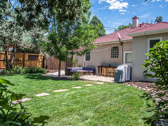 Patio and Manicured Backyard
