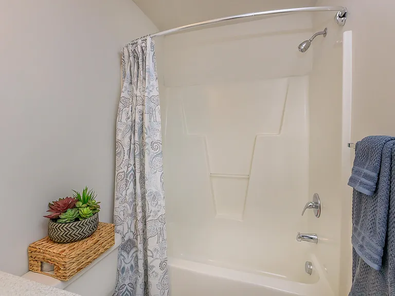 CURVED SHOWER ROD
