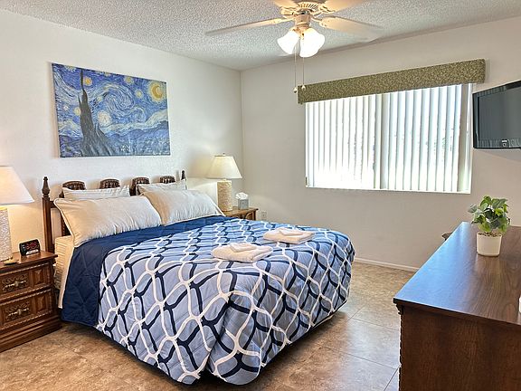 Bedroom 2 with a different comforter.