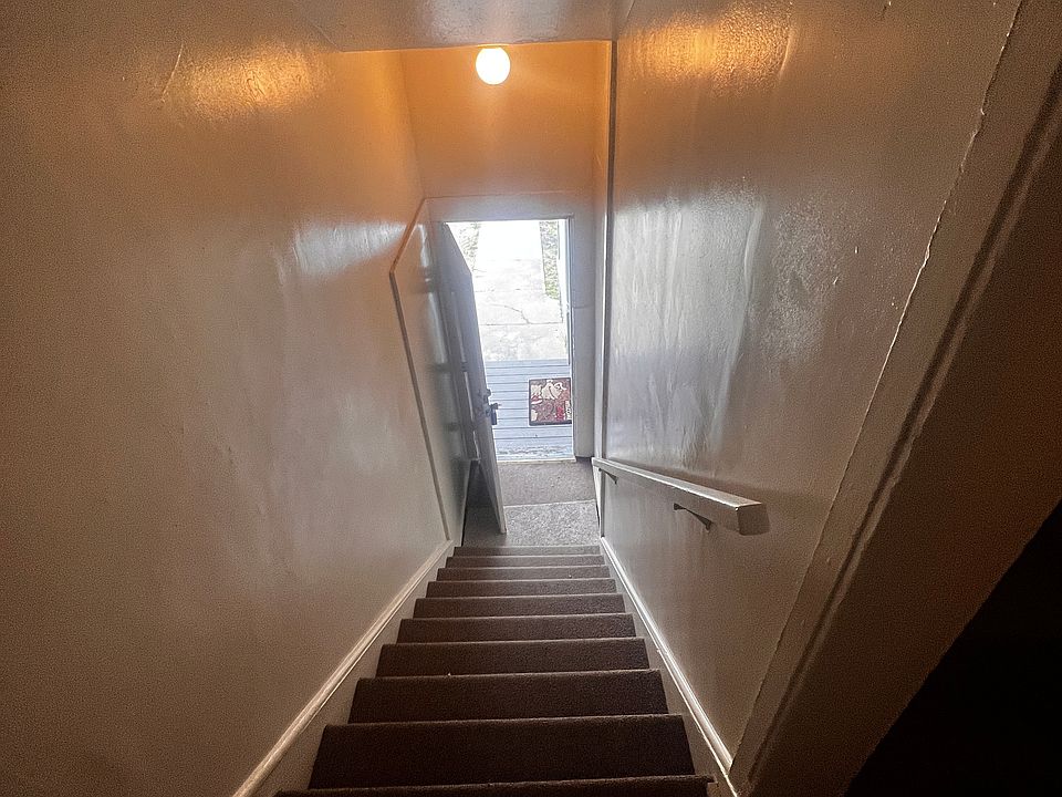 View to front entry from top of stairs