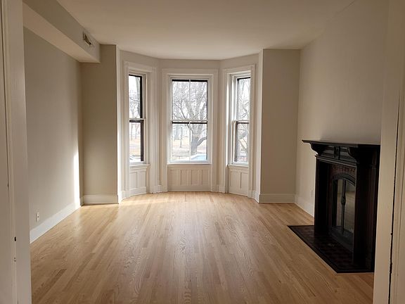 Beautiful natural light floods the living room in the morning - these windows face Wooster Square Park which is lined with beautiful Cherry trees.